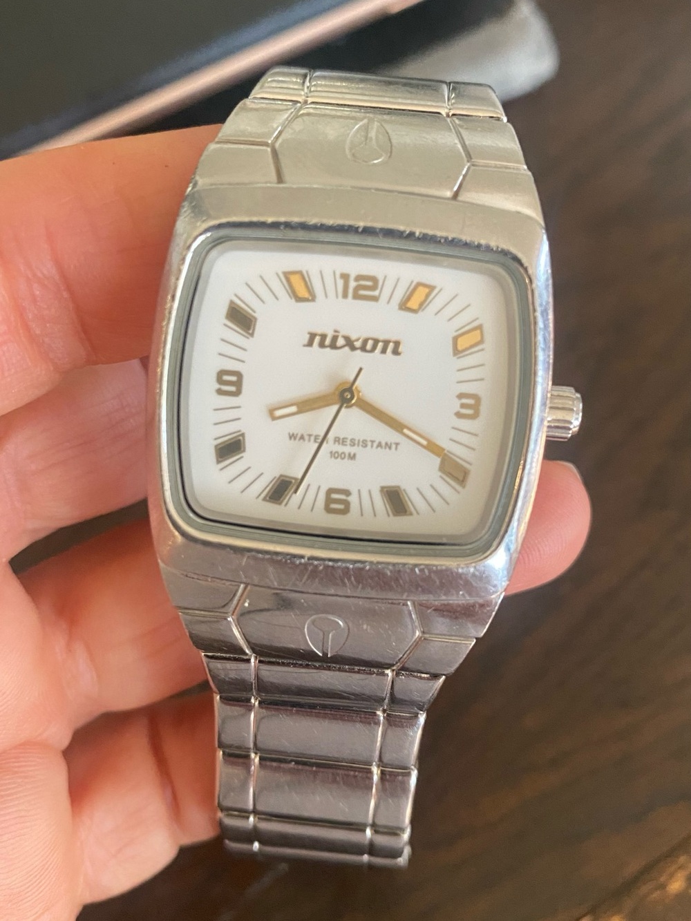 For parts:Nixon The Manual Show Don’t Tell Silver watch/White Dial/ Gold Accents